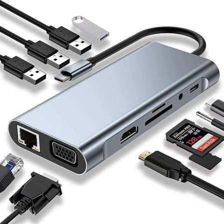 PanCore 11 in 1 USB-C Adapter connected to MacBook Pro with dual monitors and peripherals in a European workspace