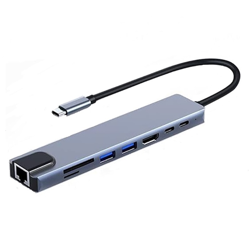 PANCORE USB-C Adapter 8 Ports PanCore 8-in-1 USB-C Adapter connected to a MacBook Pro with dual displays and peripherals in a European workspace